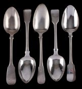 Five assorted Georgian and later Fiddle pattern table spoons, various makers and dates: initialled,