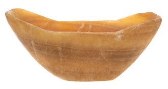 An Indo-Persian polished stoneware bowl: of oval outline, 27cm wide.