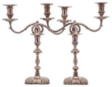 A pair of George V silver twin-branch candelabra, maker Joseph Rodgers & Sons, Sheffield,