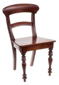 An apprentice's style mahogany dining chair in the Georgian taste: with rail back above a solid