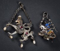 An Austro-Hungarian enamelled silver St George and the Dragon pendant: and a similar lion rampant