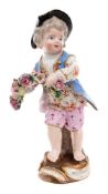 A small Meissen figure of a boy holding a garland: on rocaille moulded tree stump base,