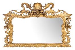 An early 19th Century carved giltwood landscape overmantel mirror:, with scallop shell,