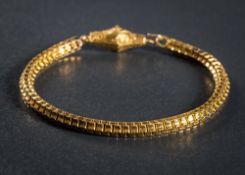 A 19th Century gold bracelet: with foliate engraved hook clasp, approximately 18.5cm overall length.