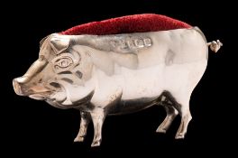 A George V novelty silver pin cushion, maker's mark rubbed, Birmingham, 1920: in the form of a pig,