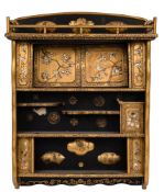 A Japanese black lacquer and gilt Shibyama decorated wall cabinet:,