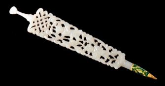 A Chinese celadon jade and enamel ear wax spoon: carved and pierced with two figures amongst