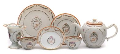 A Chinese Export famille rose part tea service: painted with the initials 'GW' contained within a