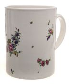 A large Plymouth cylindrical mug: with lobed loop handle, painted with floral sprays and sprigs,