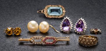 A 9ct gold, ruby and diamond bar brooch, a pair of amethyst and diamond pear-shaped ear studs,