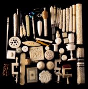 A group of 19th and early 20th Century ivory sewing accoutrements: includes bodkin cases,