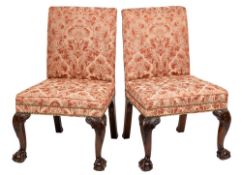 A pair of mid 18th Century and later carved mahogany side chairs in the Chippendale taste:,
