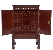 A collectors 19th Century mahogany and inlaid cabinet:, bordered with boxwood,