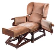 An Edwardian stained beech adjustable wing armchair:, fully upholstered in Dralon velvet fabric,