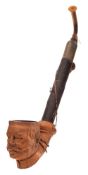 A German pottery smoker's pipe,