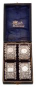 A set of four Edwardian silver napkin rings, maker Kemp Brothers, Birmingham,