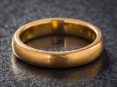 A 22ct gold wedding band: approximately 5.5gms gross weight.