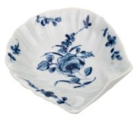 A First Period Worcester scallop shell pickle dish: painted with the 'Rose and Floral Sprays'