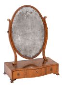A George III mahogany and inlaid oval swing frame platform toilet mirror:,