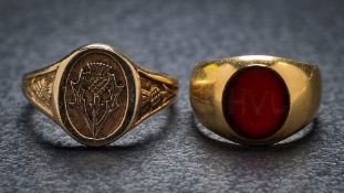 An 18ct gold signet ring together with a 9ct gold thistle motif signet ring.