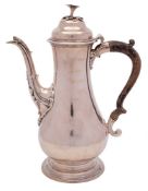 A George III silver coffee pot, maker WT possibly William Turton, London,