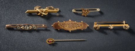 An aquamarine and seed pearl bar brooch: together with a seed pearl and 'nugget' set bar brooch,