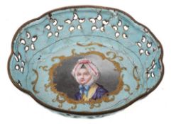 An 18th century Continental enamel dish: of lobed outline with central portrait cartouche of a lady,