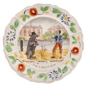 A rare 'performing bear' nursery plate: with floral moulded rim,