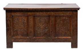 A late 17th Century oak rectangular coffer:, with a plain hinged moulded top,