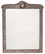 A large Victorian embossed silver mounted easel dressing table mirror, maker Henry Matthews,