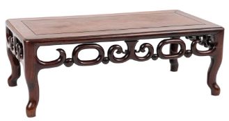 A Chinese Hua-Li wood rectangular urn table:, with a pierced scroll apron, on cabriole legs,