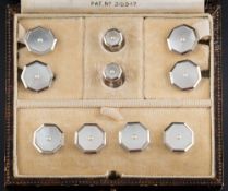 A cased set of Art Deco mother of pearl and seed pearl mounted octagonal cuff-links,