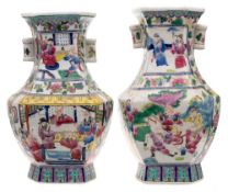 A pair of Chinese porcelain vases: of archaic form probably for the Straits market decorated with
