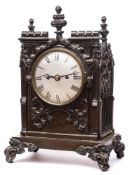 A Victorian bronze Gothic bracket clock: the eight-day duration,