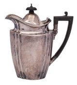 An Edward VII Silver hot water jug, maker Sibray hall & Co,