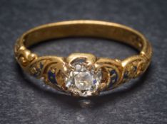 A mid 19th Century gold and diamond single-stone ring: the round old brilliant-cut diamond