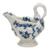 A First Period Worcester dolphin ewer creamboat: of rococo shell moulded form with lamprey handle,