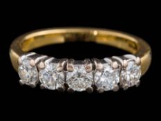 An 18ct gold and diamond five-stone ring: set with round,