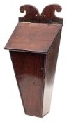 An 18th century mahogany candle box: of rectangular tapering form with hinged lid, 48cm high.