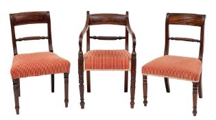 A harlequin set of five Regency mahogany dining chairs:,