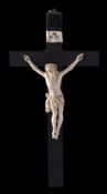 A 19th Century Continental carved ivory and ebony crucifix: 25cm high.