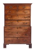 A George III mahogany chest on chest:, the upper part with a moulded cornice,
