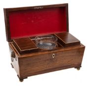 A Regency mahogany and boxwood strung tea caddy: of sarcophagus outline,