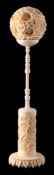 A late 19th/early 20th Century Cantonese carved ivory concentric puzzle ball and stand: of