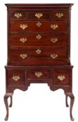 A mahogany chest on stand in the Georgian taste:,