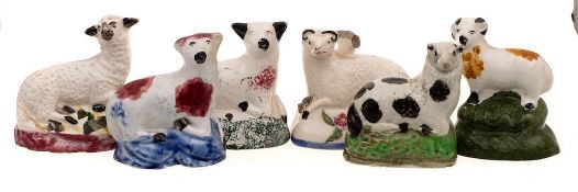A group of six early 19th century Newcastle/Portobello small models of sheep: decorated in pink,