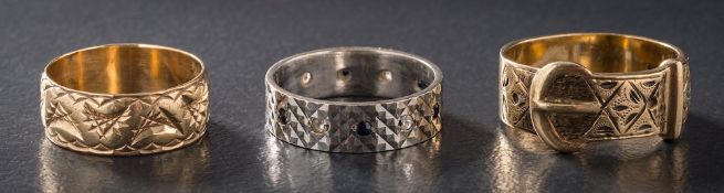 A 9ct white gold and blue and white stone-set band,: a 9ct gold buckle ring and an 9ct gold band.