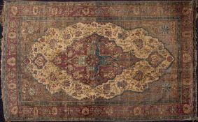 An Isfahan silk rug:,