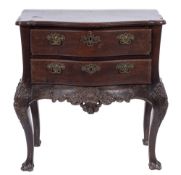 A 19th Century Portuguese carved hardwood serpentine fronted commode:,
