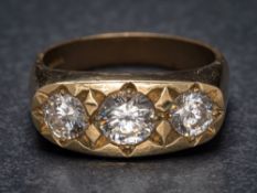 A 9ct gold and cubic zirconia three-stone ring: the shank with Sheffield assay marks, ring size R.